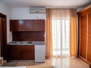 Kuchyň nebo kuchyňský kout v ubytování Apartments Bonita + 37 fotografií