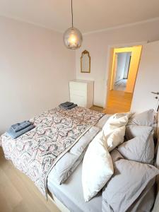 Кровать или кровати в номере Der Stadtwinkel