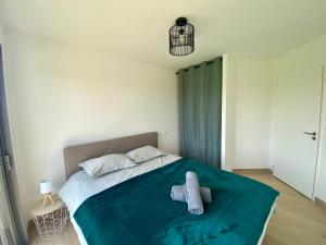 Postel nebo postele na pokoji v ubytování La Colinette Chambretaud - 5min du PuyDuFou