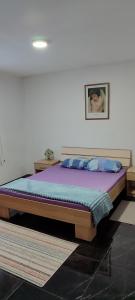 Postel nebo postele na pokoji v ubytování Apartman Kalina