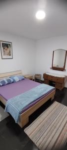 Postel nebo postele na pokoji v ubytování Apartman Kalina