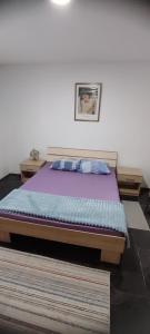 Postel nebo postele na pokoji v ubytování Apartman Kalina