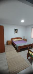 Postel nebo postele na pokoji v ubytování Apartman Kalina