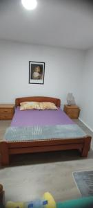 Postel nebo postele na pokoji v ubytování Apartman Kalina