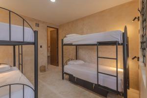 Postelja oz. postelje v sobi nastanitve Hostal Yum Kin