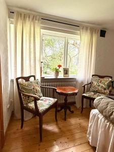 Posezení v ubytování Rävåkra B&B Österlen