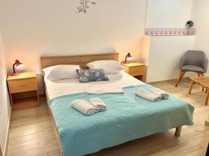 Ένα ή περισσότερα κρεβάτια σε δωμάτιο στο Seaside