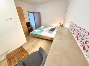 Ένα ή περισσότερα κρεβάτια σε δωμάτιο στο Seaside