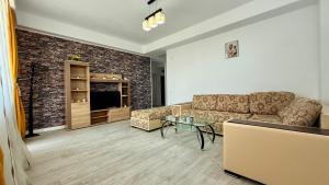 Posezení v ubytování M11 Apartament Mamaia