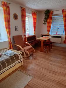 Postel nebo postele na pokoji v ubytování Apartmány Merkel