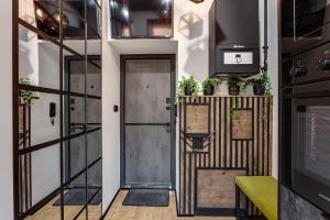 Η κουζίνα ή μικρή κουζίνα στο Lviv City Center Loft +10 φωτογραφίες
