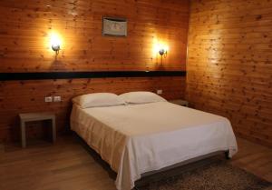 Letto o letti in una camera di Agroturizem Bylis