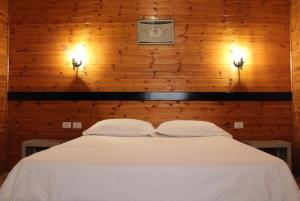 Letto o letti in una camera di Agroturizem Bylis