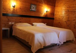 Letto o letti in una camera di Agroturizem Bylis