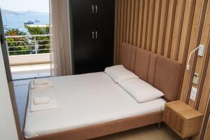 Postel nebo postele na pokoji v ubytování Hotel Piazza
