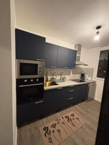 Η κουζίνα ή μικρή κουζίνα στο dunes dorees - chambre privee