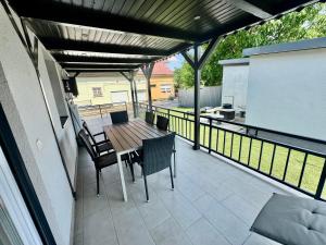 A balcony or terrace at Korona Apartman Balatonboglár
