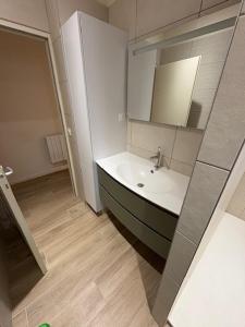 Ванная комната в Appartement centre-ville rez-de-chaussée