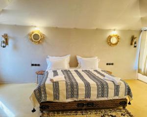 Cama o camas de una habitación en Africa Luxury Camp