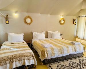 Cama o camas de una habitación en Africa Luxury Camp