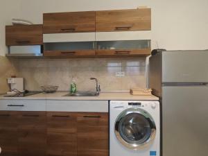 Kuchyň nebo kuchyňský kout v ubytování Aggeliki apartment