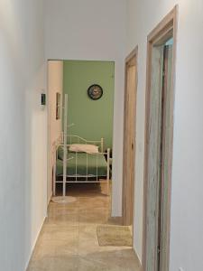 Postel nebo postele na pokoji v ubytování Aggeliki apartment