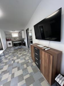 A kitchen or kitchenette at Korona Apartman Balatonboglár