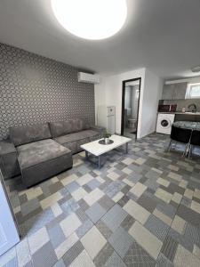 A seating area at Korona Apartman Balatonboglár
