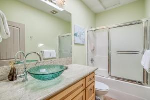 a bathroom with a sink and a shower at Coastal Dream in Lincoln City +31 photos