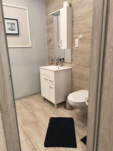 Koupelna v ubytování Apartament Na Starówce + 29 fotografií