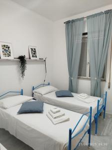 A bed or beds in a room at Casa Gioia