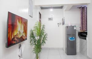 Kuchyň nebo kuchyňský kout v ubytování Upmax Cosy Home