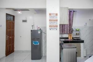 Kuchyň nebo kuchyňský kout v ubytování Upmax Cosy Home
