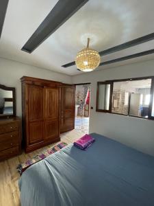 Ένα ή περισσότερα κρεβάτια σε δωμάτιο στο Cozy Apartment Tamraght