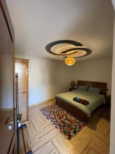 Ένα ή περισσότερα κρεβάτια σε δωμάτιο στο Cozy Apartment Tamraght