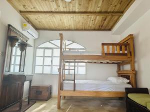 Postel nebo postele na pokoji v ubytování Quinta San Gabriel House + 30 fotografií