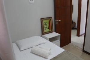 Un pat sau paturi într-o cameră la Apartamento Luxo Centro Paty do Alferes +16 fotografii