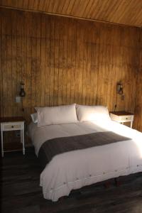 Postel nebo postele na pokoji v ubytování Nevada Malalcahuello