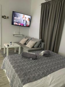 Postel nebo postele na pokoji v ubytování Dominik apartment