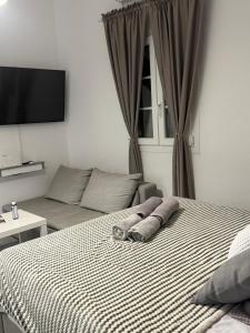 Postel nebo postele na pokoji v ubytování Dominik apartment