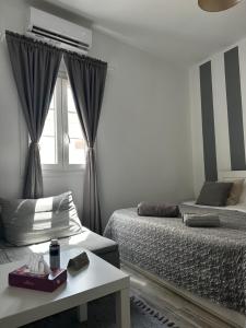 Postel nebo postele na pokoji v ubytování Dominik apartment