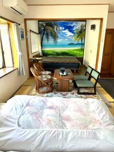 TV a/nebo společenská místnost v ubytování Guest house En
