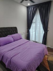 Postel nebo postele na pokoji v ubytování Townhouse, Kita Bayu, Cybersouth