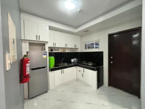Kjøkken eller kjøkkenkrok på RnB Homes and Spaces + 7 bilder