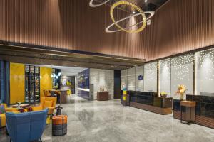 Posezení v ubytování Hampton by Hilton Dongguan Fenggang