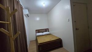 Postel nebo postele na pokoji v ubytování 3 Bedroom House in Pampanga