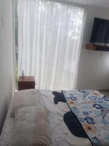 Postel nebo postele na pokoji v ubytování Casa blanca