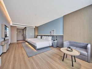 Ліжко або ліжка в номері Country Inn&Suites By Radisson, Xi'an Bell and Drum Tower Flagship