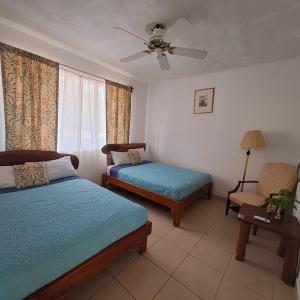 Postel nebo postele na pokoji v ubytování Hotel Georgi