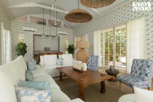 a living room with a white couch and chairs at StayVista at Villa Selene - Dolly J Homes with Pool in Sangolda +59 photos